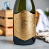 Metalen champagne fles wijnetiket
