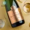 Metalen champagne fles wijnetiket